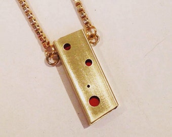 Peek a boo Mirrored Red Plex with Brass necklace pendant