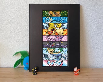 May include: A framed pixel art piece featuring various colorful Pokémon characters. The artwork is displayed in a black frame and includes characters like Eevee, Vaporeon, Jolteon, Flareon, Espeon, Umbreon, Leafeon, Glaceon, and Sylveon.