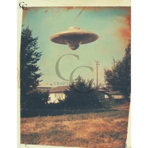 May include: A vintage-style image depicts a metallic, saucer-shaped UFO hovering over a suburban neighborhood. The sky is a faded blue, and the scene has a retro, aged aesthetic. The foreground shows a grassy area with trees and houses in the background.