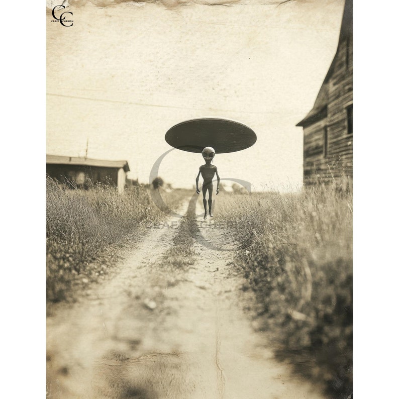 May include: Sepia-toned image of an alien figure walking down a dirt road, with a large, dark disc hovering above its head. The scene includes a rural landscape with a barn and small buildings in the background.