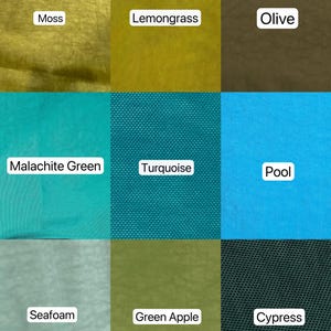 May include: A color palette featuring nine fabric swatches in shades of green and blue. The swatches are labeled with color names such as "Moss", "Lemongrass", "Olive", "Malachite Green", "Turquoise", "Pool", "Seafoam", "Green Apple", and "Cypress".