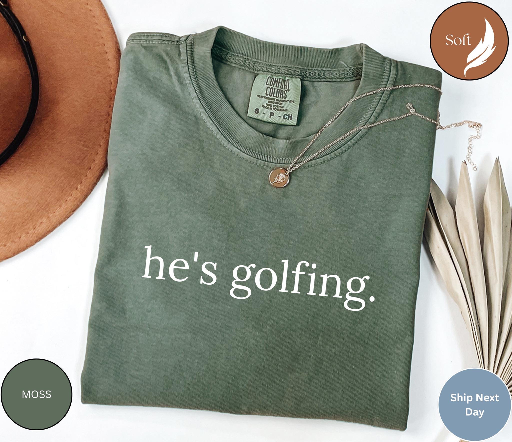 Comfort Colors® He's Golfing Shirt, Golfer Wife Shirt,Golf Player Shirt for Mom, Golfing Season Shirt, Golf Lover Shirt, Golfing Mom T-shirt