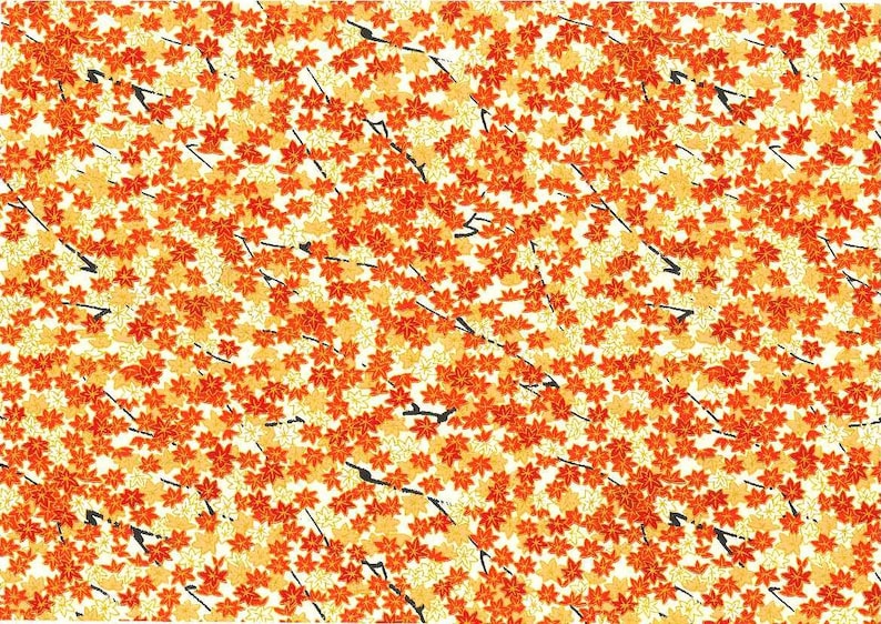May include: A seamless pattern featuring a repeating design of orange and yellow flowers on a white background. The flowers are stylized and have a simple, elegant design.