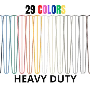 Op de afbeelding: Afbeelding van 29 haarspeldpoten in diverse kleuren, waaronder zwart, blauw, groen, roze, geel, wit en grijs. De tekst "29 KLEUREN" en "HEAVY DUTY" staan boven en onder de poten. Deze poten zijn voor meubels.