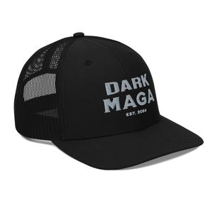 May include: Black trucker hat with a white embroidered logo that says "DARK MAGA EST. 2024".