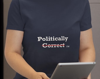May include: Navy blue t-shirt with the text "Politically Correct" in white, with the word "Correct" crossed out in red. The person is holding a tablet.