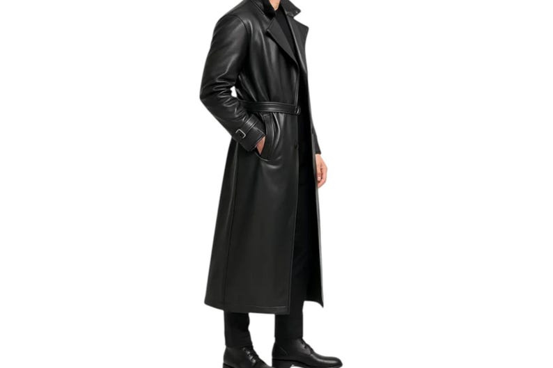 May include: A long, black leather trench coat with a belted waist and notched lapels. The coat features a classic design with a knee-length hem and a sleek, polished appearance. The coat is worn with black pants and shoes.