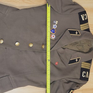 Vintage military jacket with USSR Soldier badges