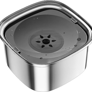 May include: A stainless steel water bowl with a removable lid. The bowl has a star-shaped design in the centre.