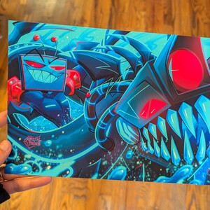 May include: A rectangular art print featuring a vibrant digital illustration of a television-headed character with red eyes and a wide grin, positioned next to a large, dark, mechanical creature with glowing red eyes and sharp blue teeth.