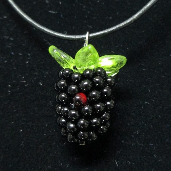 Individual Blackberries on a leather cord