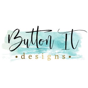 May include: A teal watercolor background with the text "Button It" in black cursive script and the words ".designs." in gold script below.