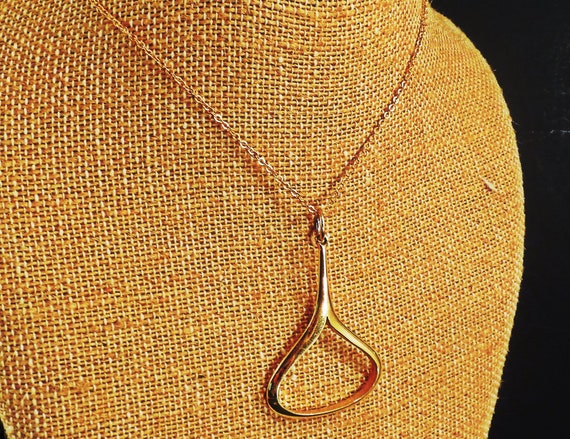 Trifari teardrop gold tone loop pendant necklace … - image 1