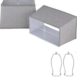 May include: Two rectangular lamp shades with a textured gray fabric exterior and a white interior lining. The shades feature a wire frame structure and are accompanied by two separate metal lamp harps with finials for assembly and support.