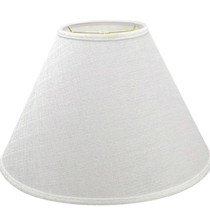 May include: A conical lampshade with a textured white fabric exterior. The shade features a clean, simple silhouette with a finished top and bottom edge. A gold-toned metal spider fitter is visible at the top opening for lamp attachment.