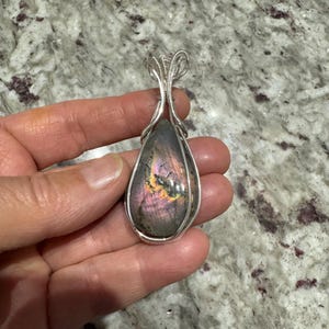 Purple Labradorite wrapped in 925 Sterling Silver