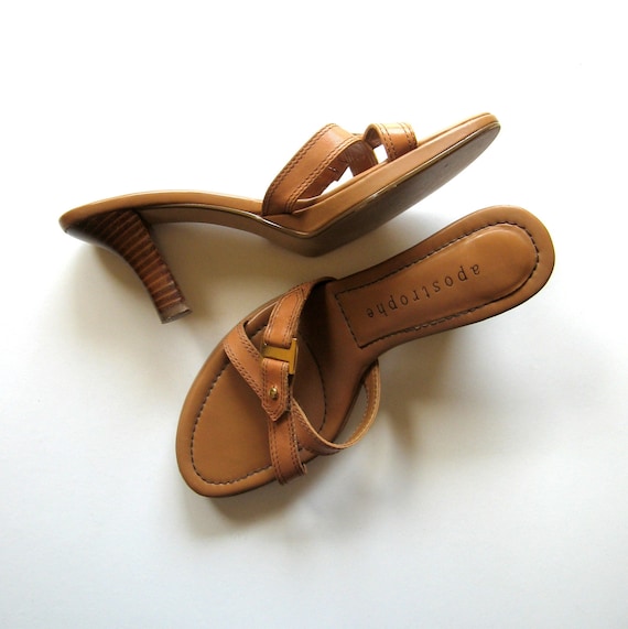 Vintage Sandals Apostrophe Melrose Slip on sandals, Brown leather, Straps, Gold buckle, Wooden heels, Made in China, Size 6.5M Vintage Sandals Apostrophe Melrose Slip on sandals, Brown leather, Straps, Gold buckle, Wooden heels, Made in China, Size 6.5M