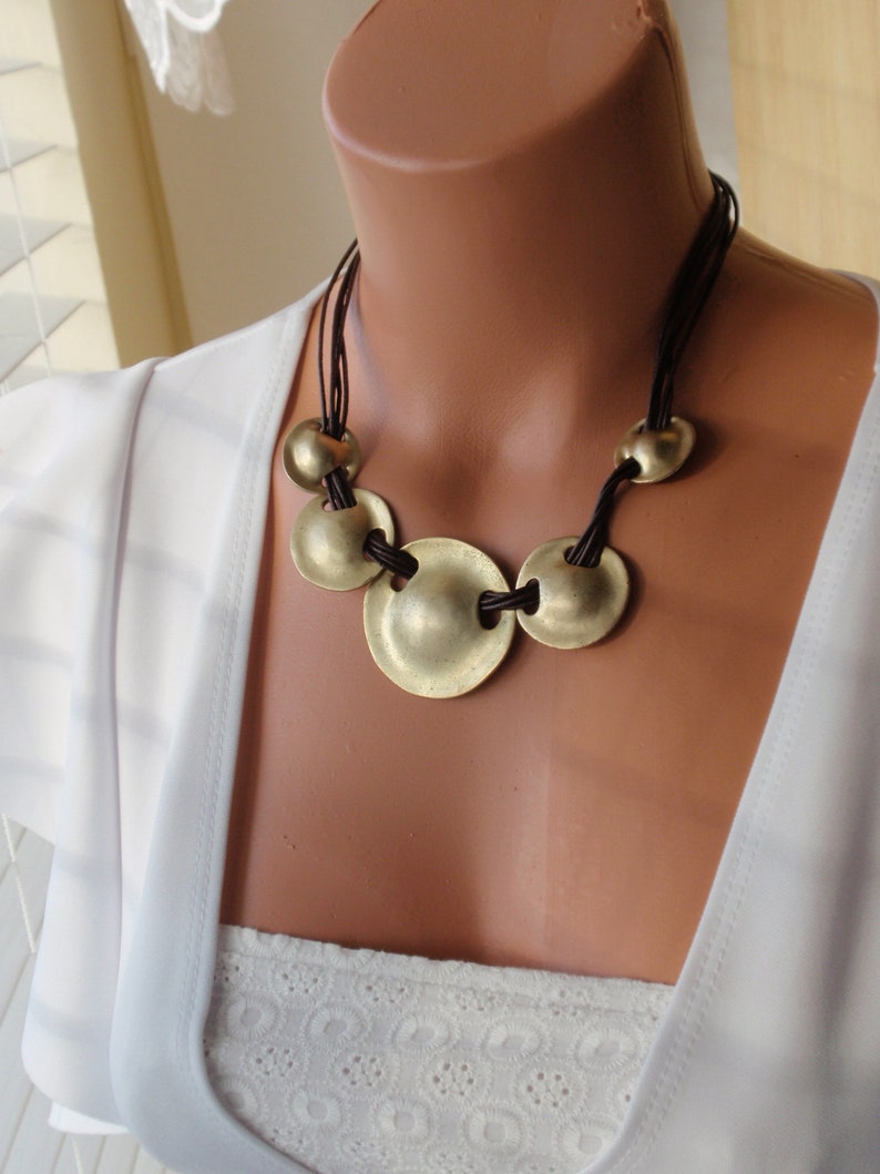 Estate jewelry Gift for her Vintage Necklace.Bib necklace.Brass discs strung with 5 strands of Leather .Unique Statement necklace.17 inch
