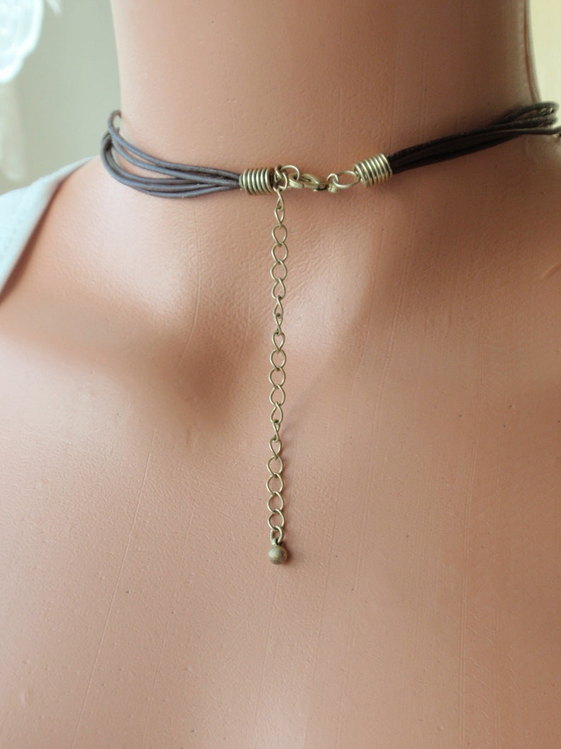 Estate jewelry Gift for her Vintage Necklace.Bib necklace.Brass discs strung with 5 strands of Leather .Unique Statement necklace.17 inch