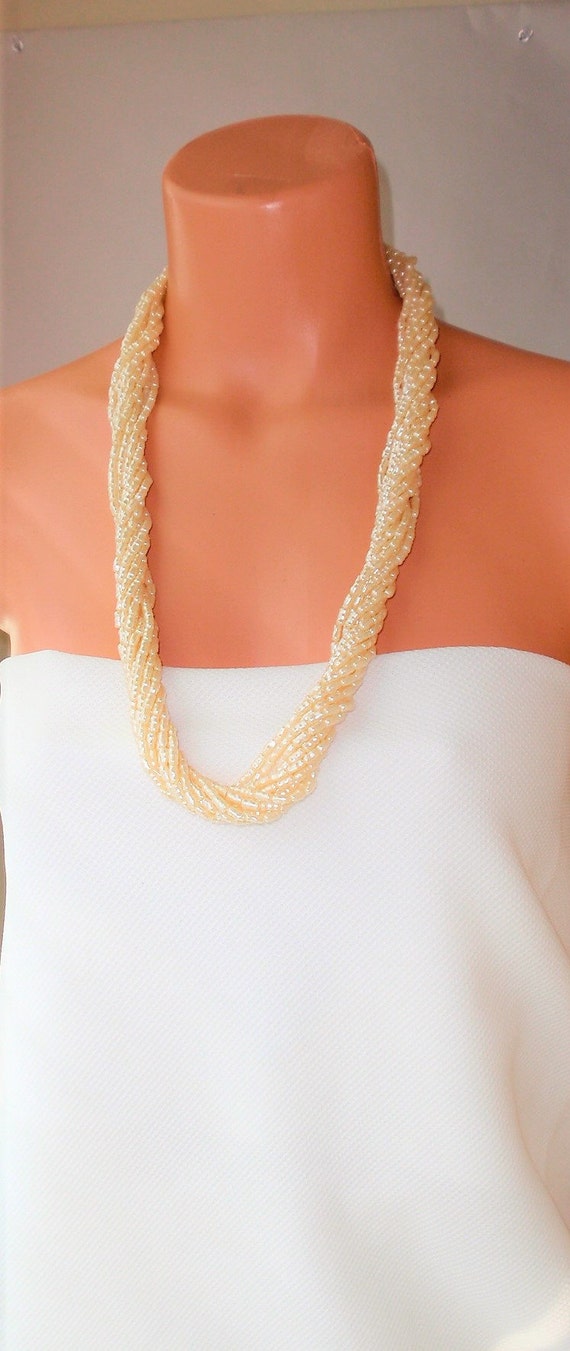 Vintage  Necklace . 12 Strands , Light weight faux