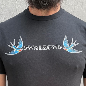 Funny Gay Tshirt | Swallows Coded Suggestive Cruising Tee | Naughty Tattoo Retro Style Shirt | NSFW LGBT Pride Oral Sex Joke Euphemism