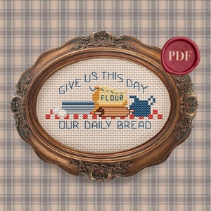 May include: A cross-stitch pattern featuring a bag of flour, a rolling pin, and two bowls with the text "Give us this day our daily bread".