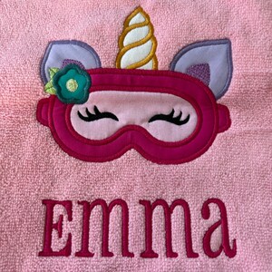 Unicorn Goggles 28 X 59 inch pink beach towel. Unicorn is an applique design.  Name is embroidered.
