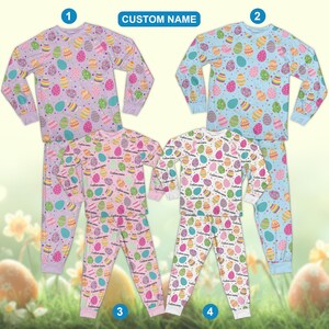 May include: Four sets of Easter pyjamas. Each set includes a long-sleeved top and matching trousers. The pyjamas feature colourful Easter egg patterns on pastel backgrounds, including lavender, light blue, pink, and white. The text "CUSTOM NAME" is visible.