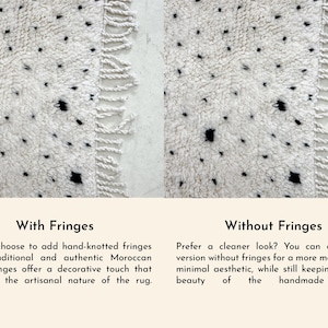 May include: Close-up of a white rug with black spots and fringed edges. The rug has a textured, plush appearance. The image shows the option of adding hand-knotted fringes for a traditional Moroccan finish.
