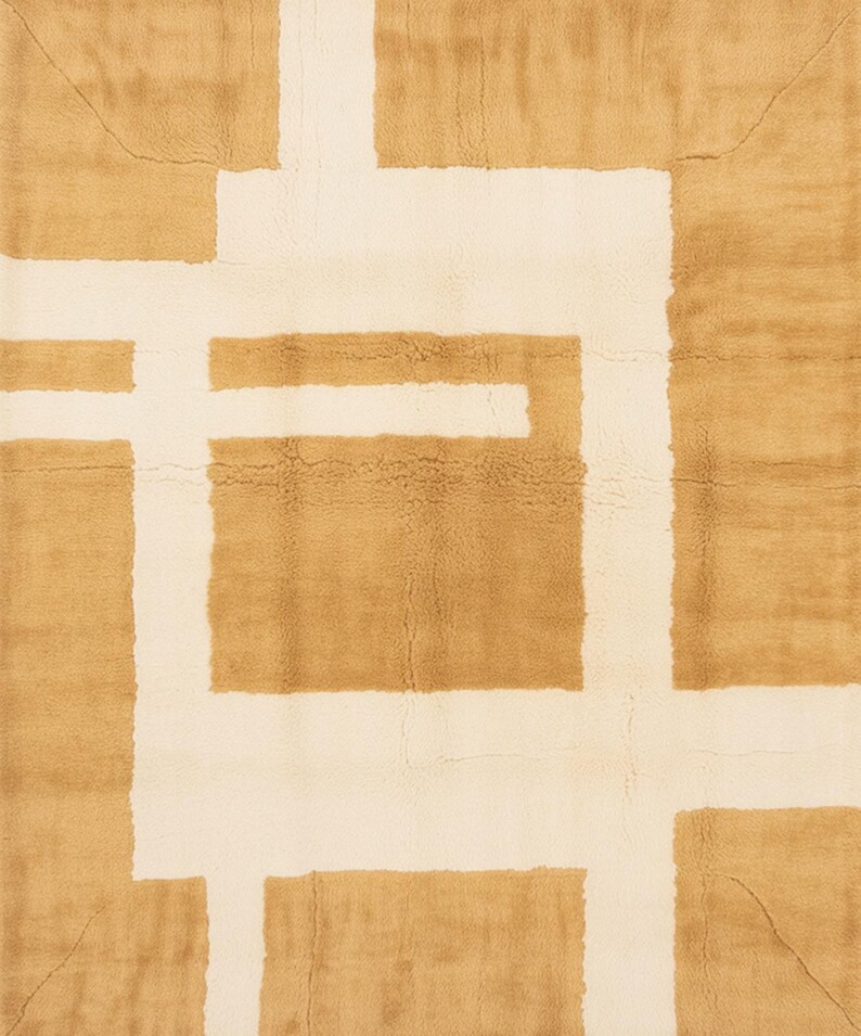 May include: A rectangular rug with a geometric design. The rug features a pattern of intersecting white lines against a tan background. The rug's texture appears soft and plush, with a subtle variation in color.