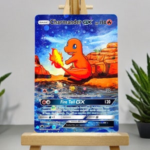 May include: Charmander GX Pokemon card with blue, orange, and red colors. The card features an illustration of Charmander with a fiery tail. The card text reads "Ember: Discard a Energy attached to Charmander GX. Fire Tail GX: Choose 1 of your opponent's Benched Pokemon. Your opponent shuffles that Pokemon and all cards attached to it into their deck. You can't use more than 1 GX attack in a game."