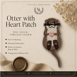 ハートと葉っぱの刺繍入りカワウソワッペン – アイロン接着ワッペン／ジャケットやキャップ用の縫い付けバッジ