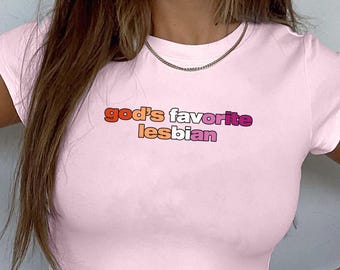 God's Favorite Lesbian Baby Tee, Aesthetic Gay Graphic Shirt, LGBTQ Bisexual Trendy Gift, Sapphic Queer Fashion, WLW Femme Subtle Pride