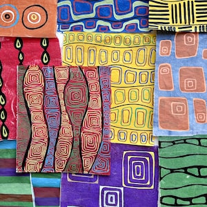May include: A patchwork of colorful abstract art pieces. The designs include spirals, geometric shapes, and lines in various colors like red, yellow, blue, and green. The artwork has a handmade, folk art aesthetic.