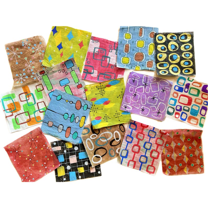 May include: A selection of square decorative papers with retro designs. The papers display a variety of patterns, including geometric shapes and atomic-age motifs. The colour palette includes red, blue, green, and yellow, evoking a mid-century modern aesthetic.
