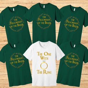 May include: Six green t-shirts with gold lettering. The shirts say "The Fellowship of the Bride" and "The One with the Ring".
