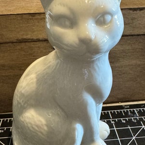 Cute white ceramic cat