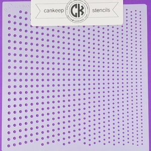 May include: A white plastic stencil with a repeating pattern of small circles arranged in a diagonal line. The stencil is on a purple background. The text "cankeep stencils" is printed on a white label in the top right corner of the image.