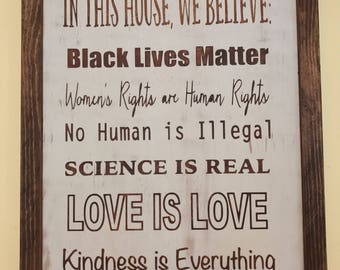 In this house we believe wooden sign
