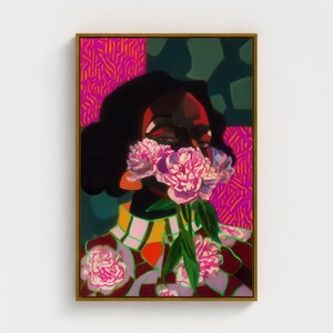May include: A gold framed canvas featuring a painting of a figure with dark hair holding a bouquet of pink and white peonies over their face. The background displays vibrant magenta and dark green geometric patterns, with the text Gold Framed Canvas.