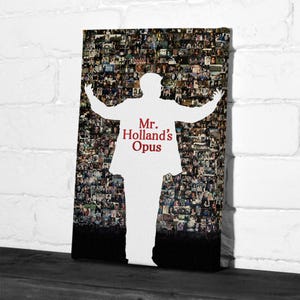 May include: A canvas print featuring a silhouette of a person with outstretched arms, overlaid on a collage of images. The words "Mr. Holland's Opus" are in red text on the silhouette.