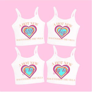 May include: Four white tank tops with a heart design and text that reads "A hot new [word] has entered the villa". The words in the heart are "little", "big", "g-big", and "gg-big".