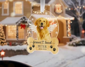 May include: A wooden car charm with a clear acrylic circle featuring a golden retriever with angel wings. The charm has the text "forever loved" with a heart, "PETER", and "2010-2024".