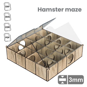 May include: A wooden hamster maze with a clear plastic lid. The maze has a grid pattern with holes for the hamster to navigate. The maze is 3mm thick.
