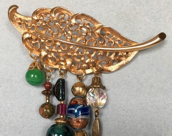SALE Vintage leaf brooch with added vintage glass and crystal beads