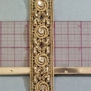 Vintage golden fabric lace trim with glass bugle beads and sequins. cut in 1 yard lengths. Era: Turn of the century zdjęcie 2
