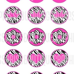 May include: Twelve pink and black zebra print cupcake toppers with different designs. The designs include a skull with a bow, a crown, a flower, a heart, and the words "Punk Princess".