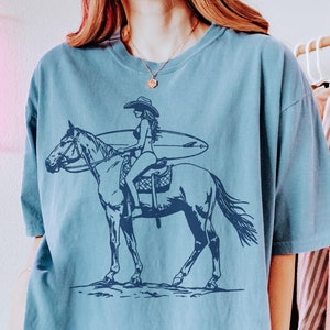 Cowgirl Shirt, Coastal Tshirt, Surf T-Shirt, Western Shirt, Retro Graphic Tee, Surfing Cowgirls, Cowgirl Horse, Country Western, Beach Shirt