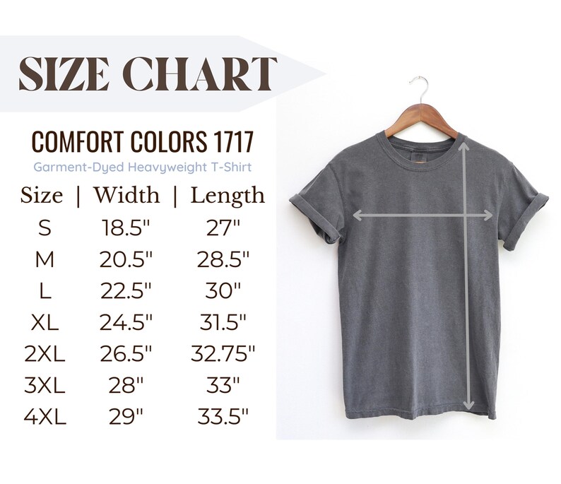 May include: A gray Comfort Colors 1717 heavyweight t-shirt hangs on a wooden hanger. The image includes a size chart with measurements in inches for sizes S through 4XL. The text "SIZE CHART" is at the top.