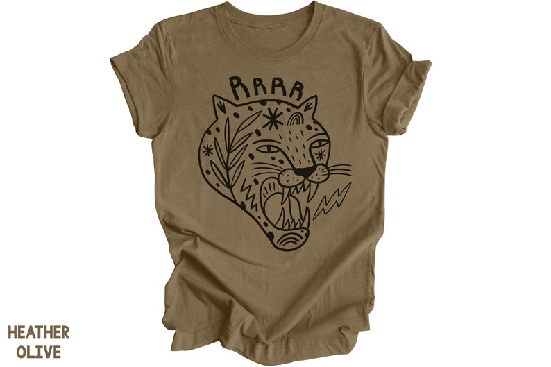 May include: A heather olive t-shirt with a black and white illustration of a roaring tiger with the word "RAWR" above it.